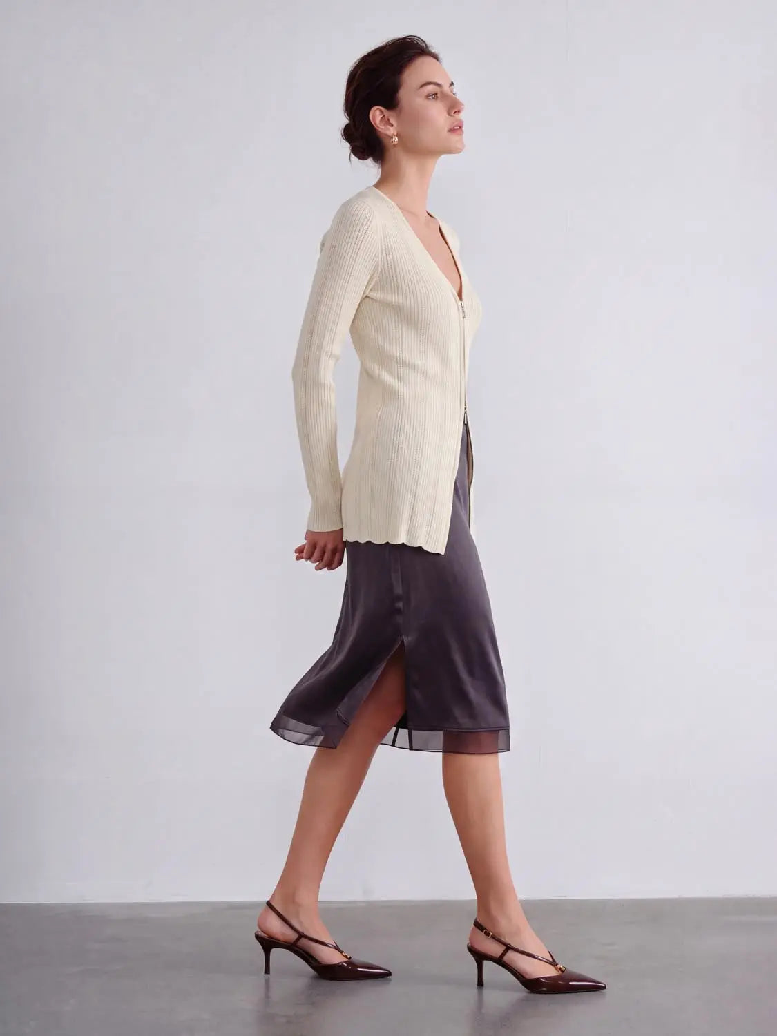 Zip Up Front Knitted Cardigans in cream ribbed knit with front zipper.