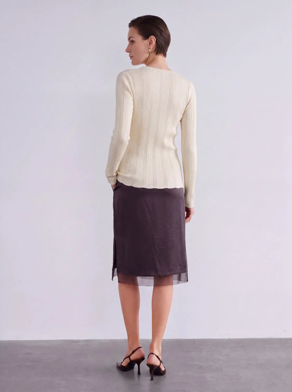 Zip Up Front Knitted Cardigans in cream ribbed knit; paired with dark plum midi skirt (two-piece outfit)