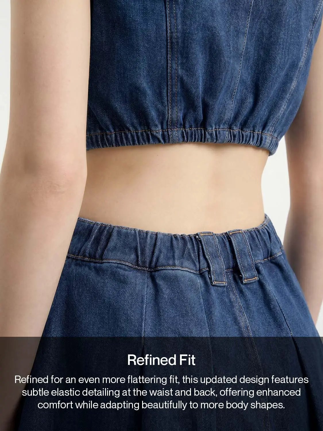 Cotton stretch denim dress in blue with sleeveless design and elastic waist, back view