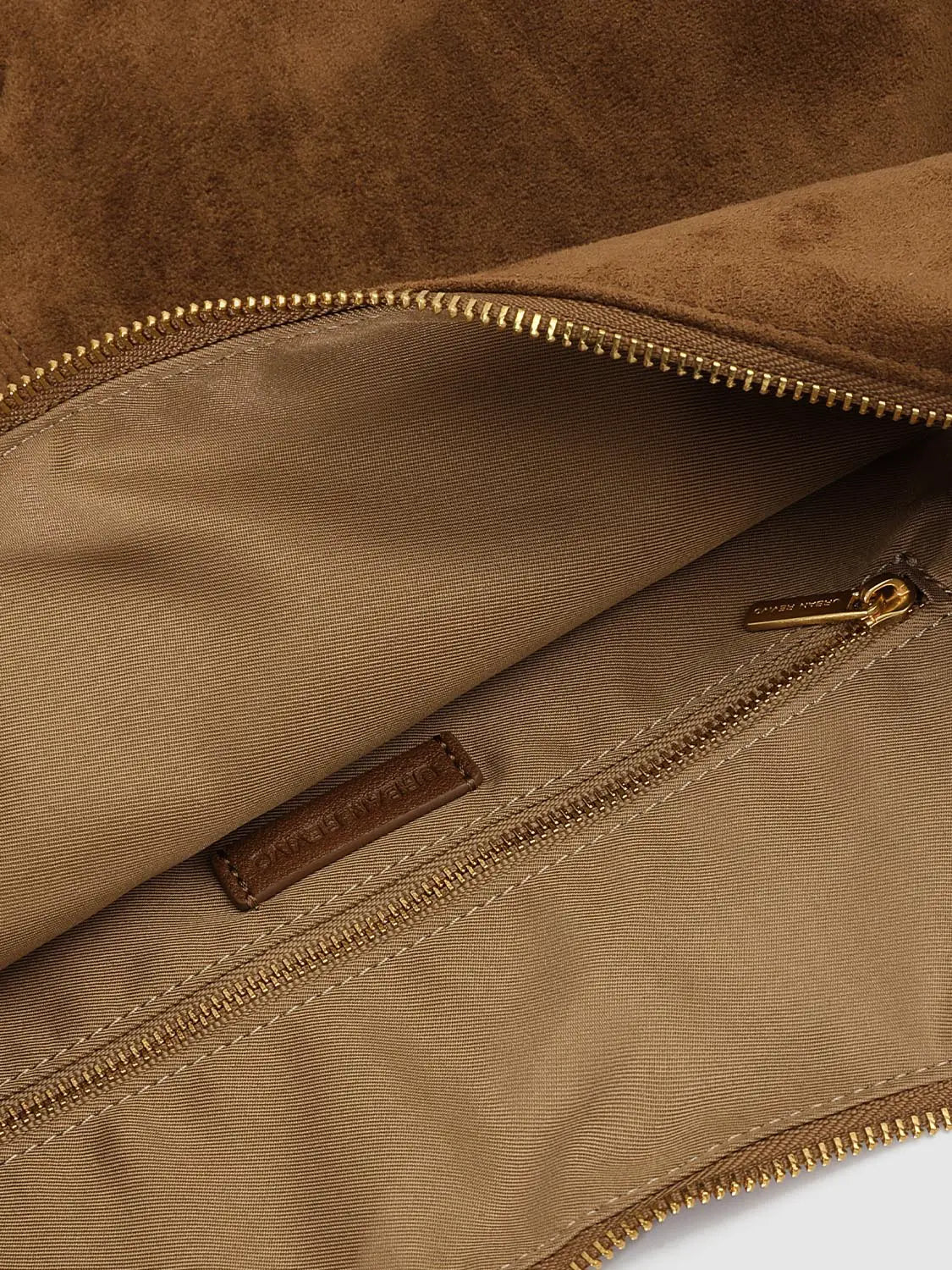 Shoulder & Crossbody Bag interior in brown with gold zipper pocket and Urban Revivo leather tag