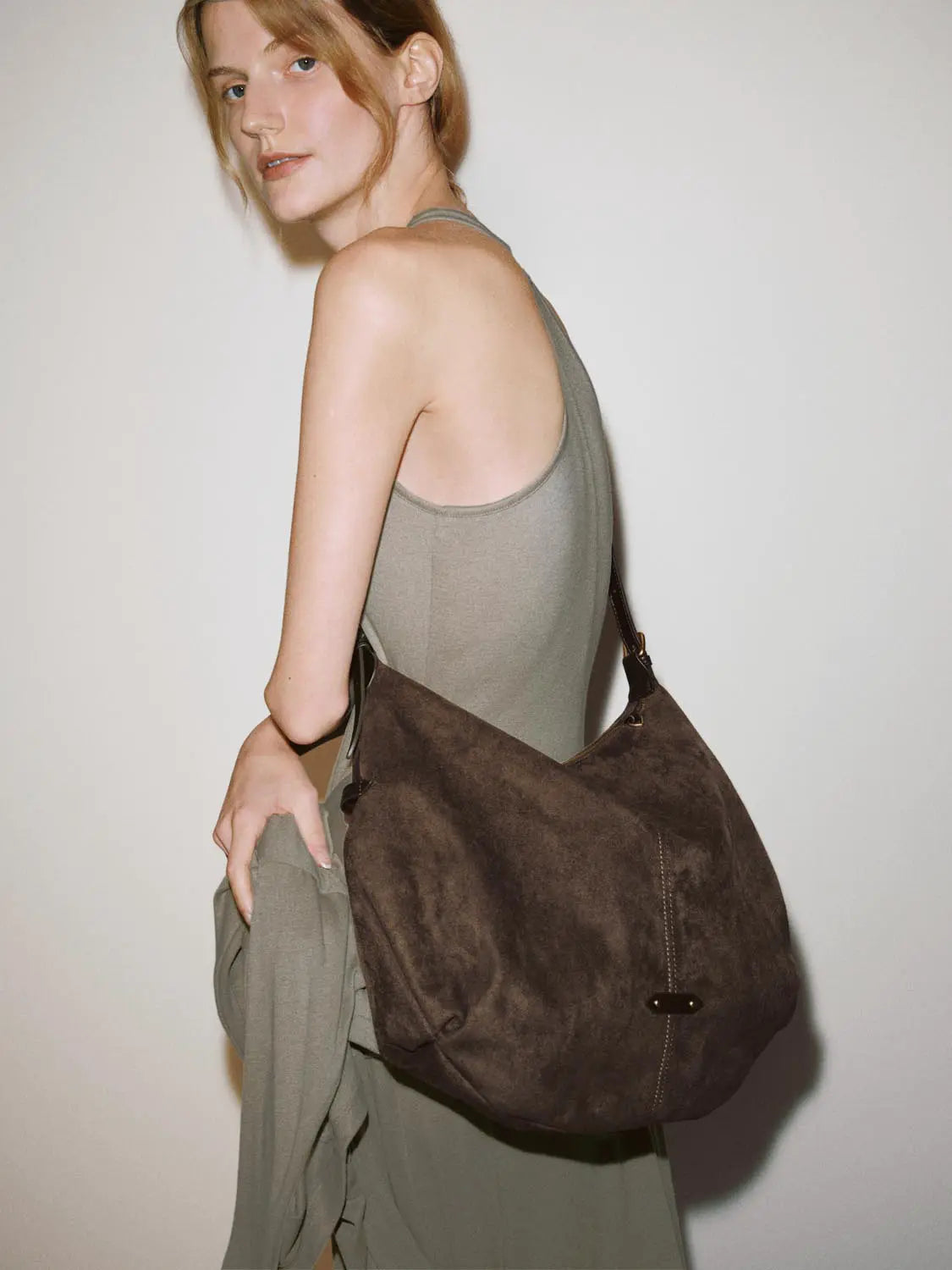 Shoulder & Crossbody Bag in dark brown suede with adjustable strap by Urban Revivo Fashion.