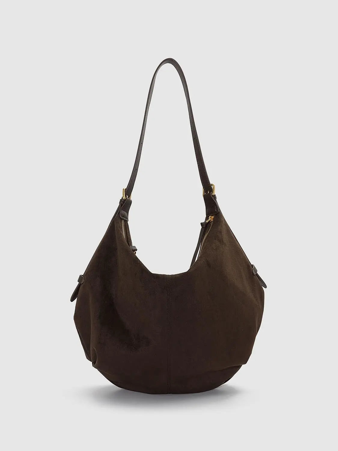 Shoulder & Crossbody Bag by Urban Revivo in dark brown suede with gold-tone hardware and long strap.
