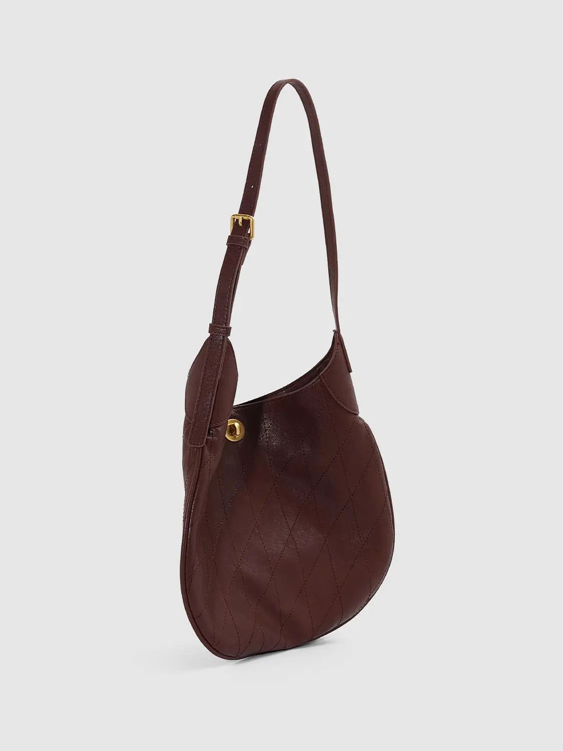 Shoulder bag in burgundy quilted leather with gold-tone hardware and adjustable strap