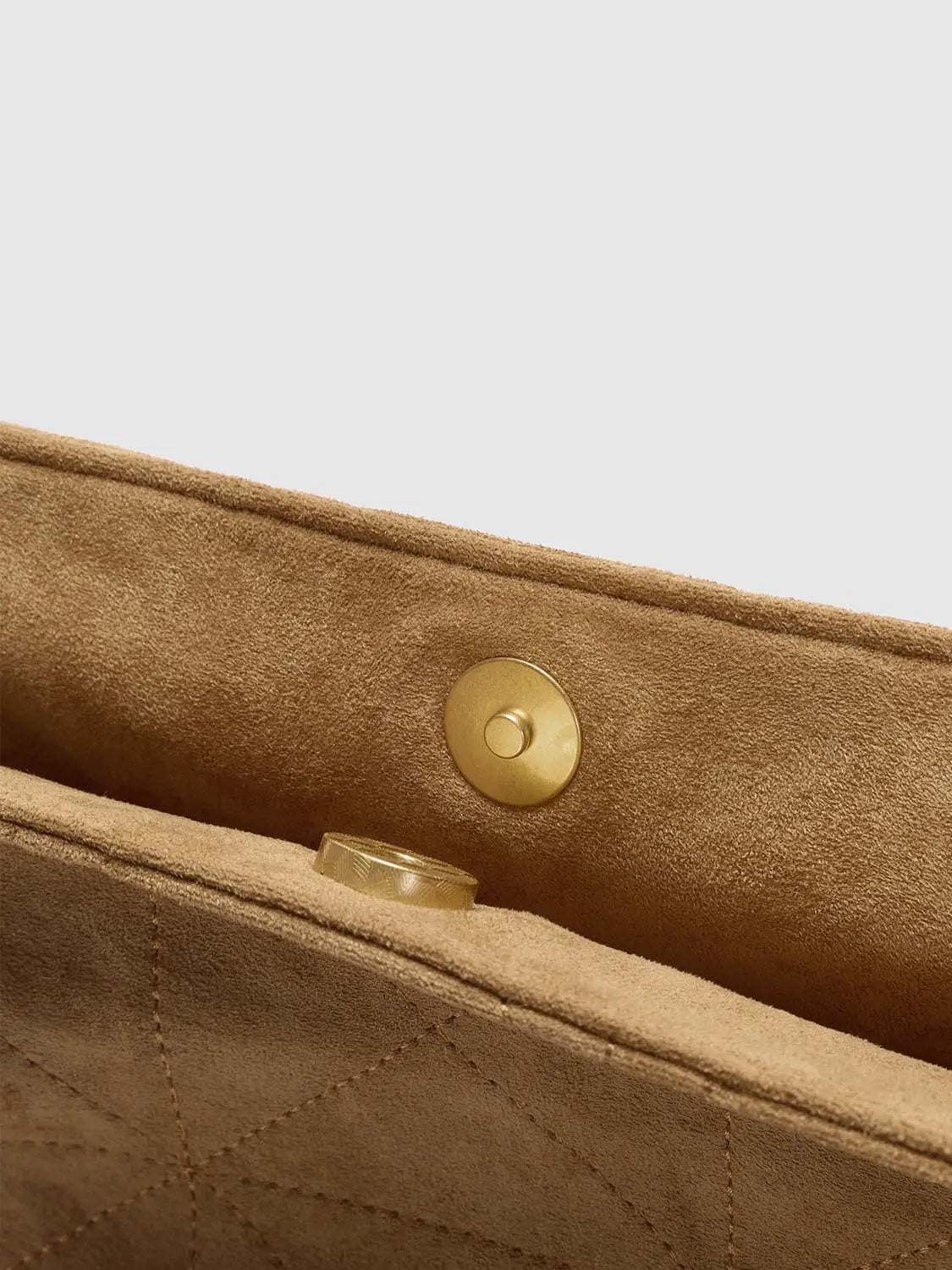 Crossbody bag in tan suede with a gold-tone snap closure