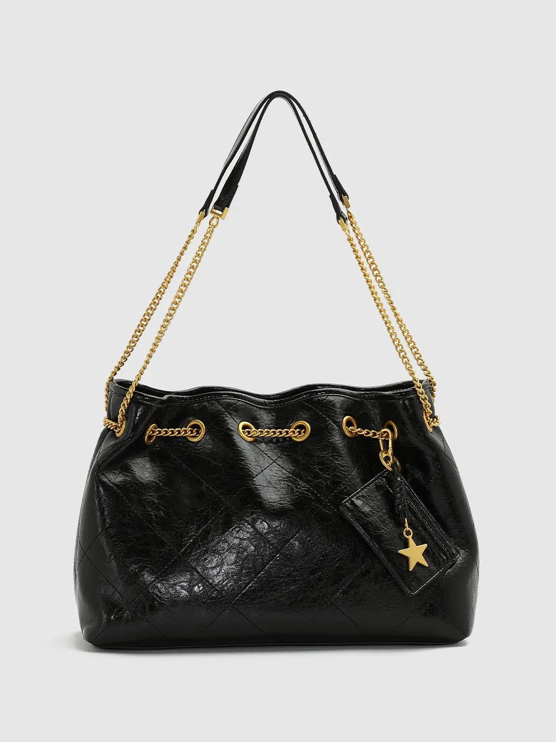 Shoulder & Crossbody Bag in black quilted leather with gold-tone chain straps and star charm.