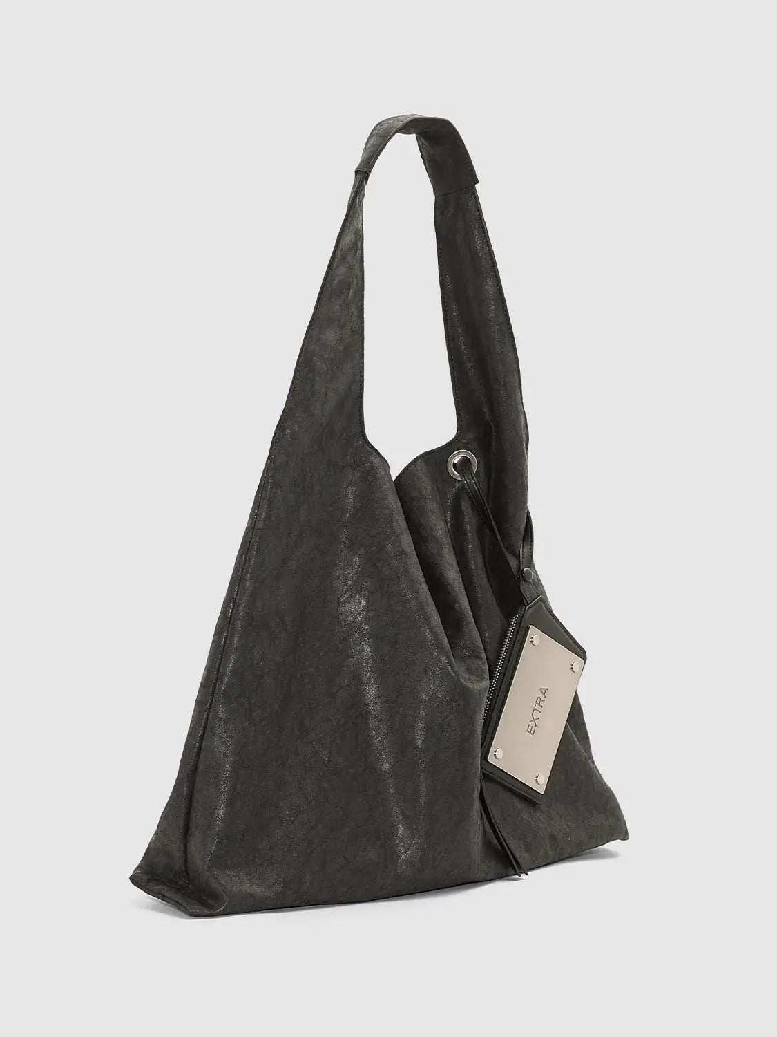 Shoulder bag in charcoal gray with a slouchy silhouette and metal plate tag.