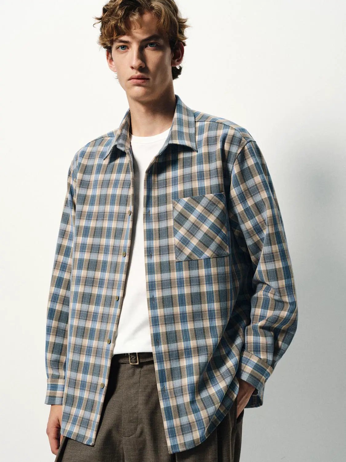 Cardigan by Urban Revivo Fashion in blue-beige plaid, worn over white tee