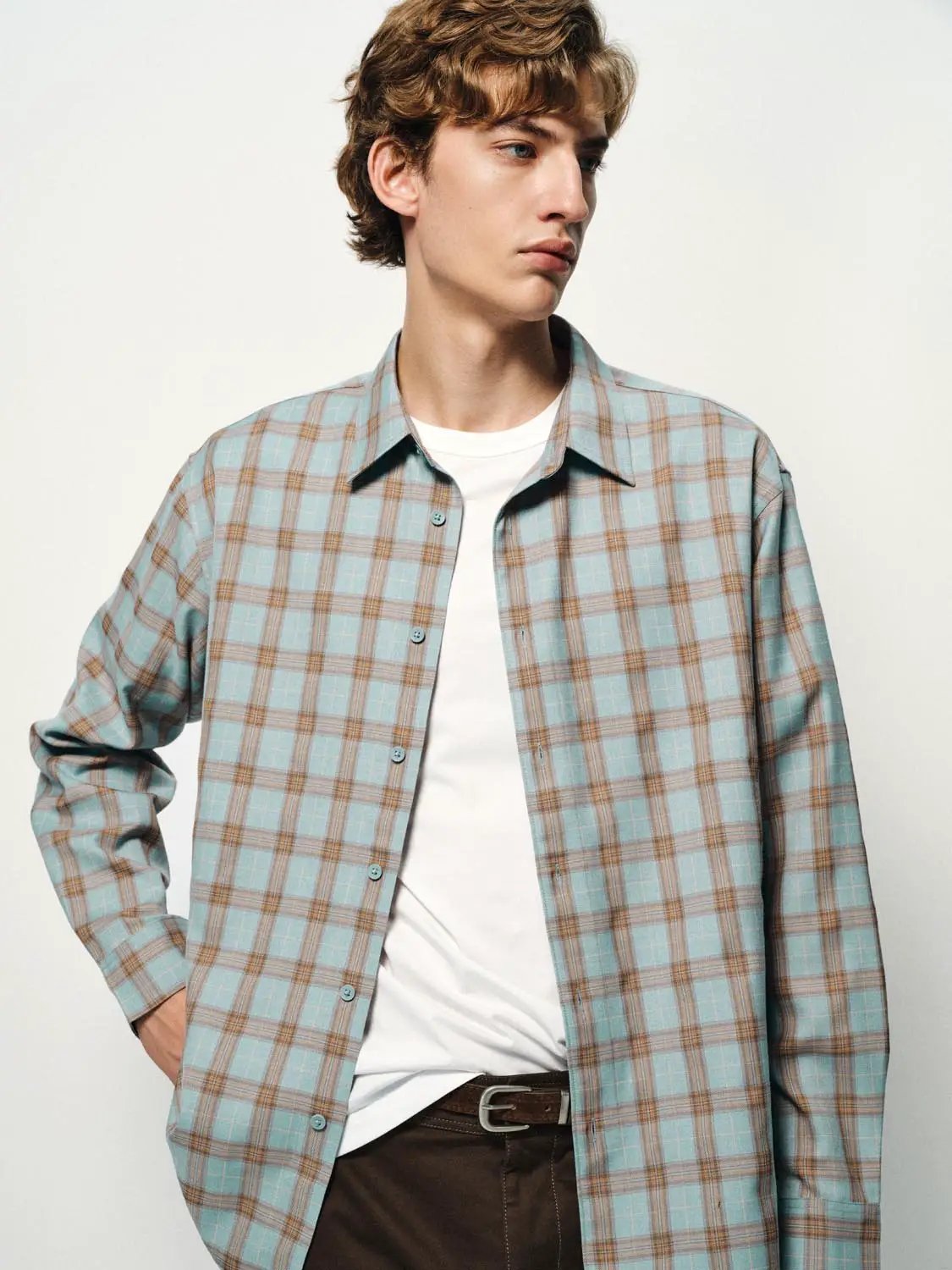Open-Front Shirts, light blue plaid shirt worn open over white tee.