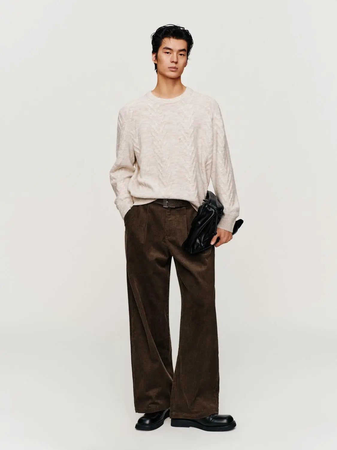 Knit Top by Urban Revivo Fashion; beige textured crew-neck sweater on model