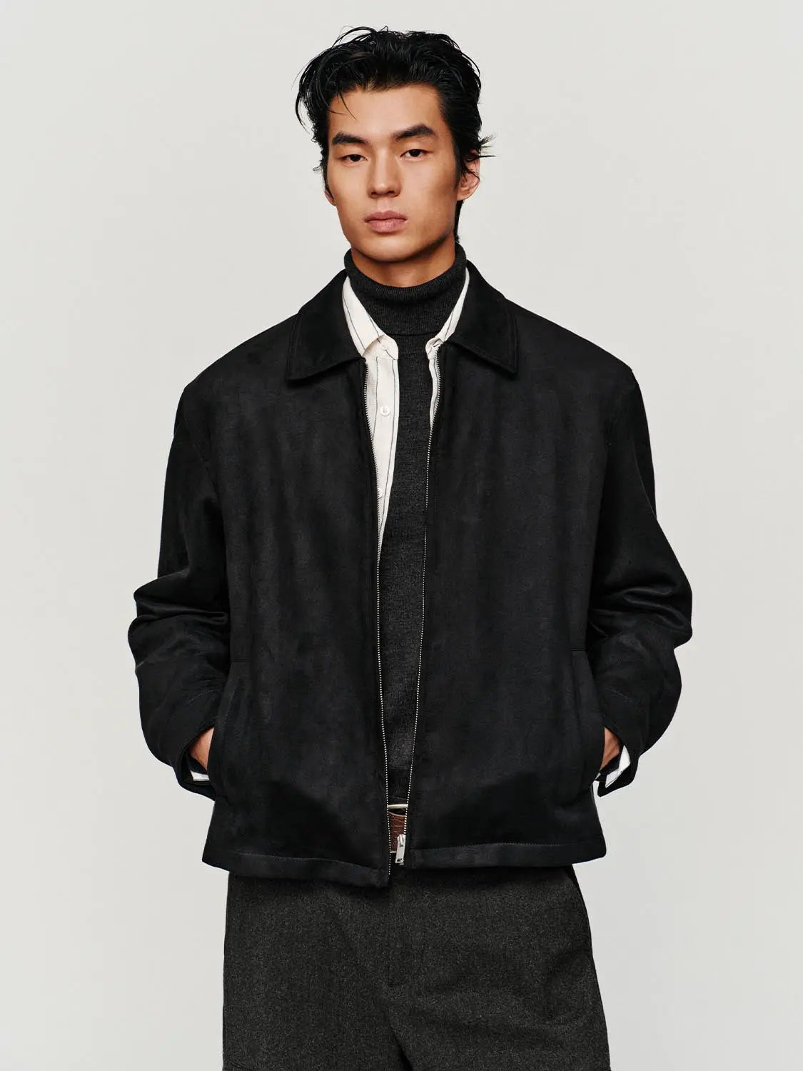 Jacket in black suede-like fabric with a zip-front closure