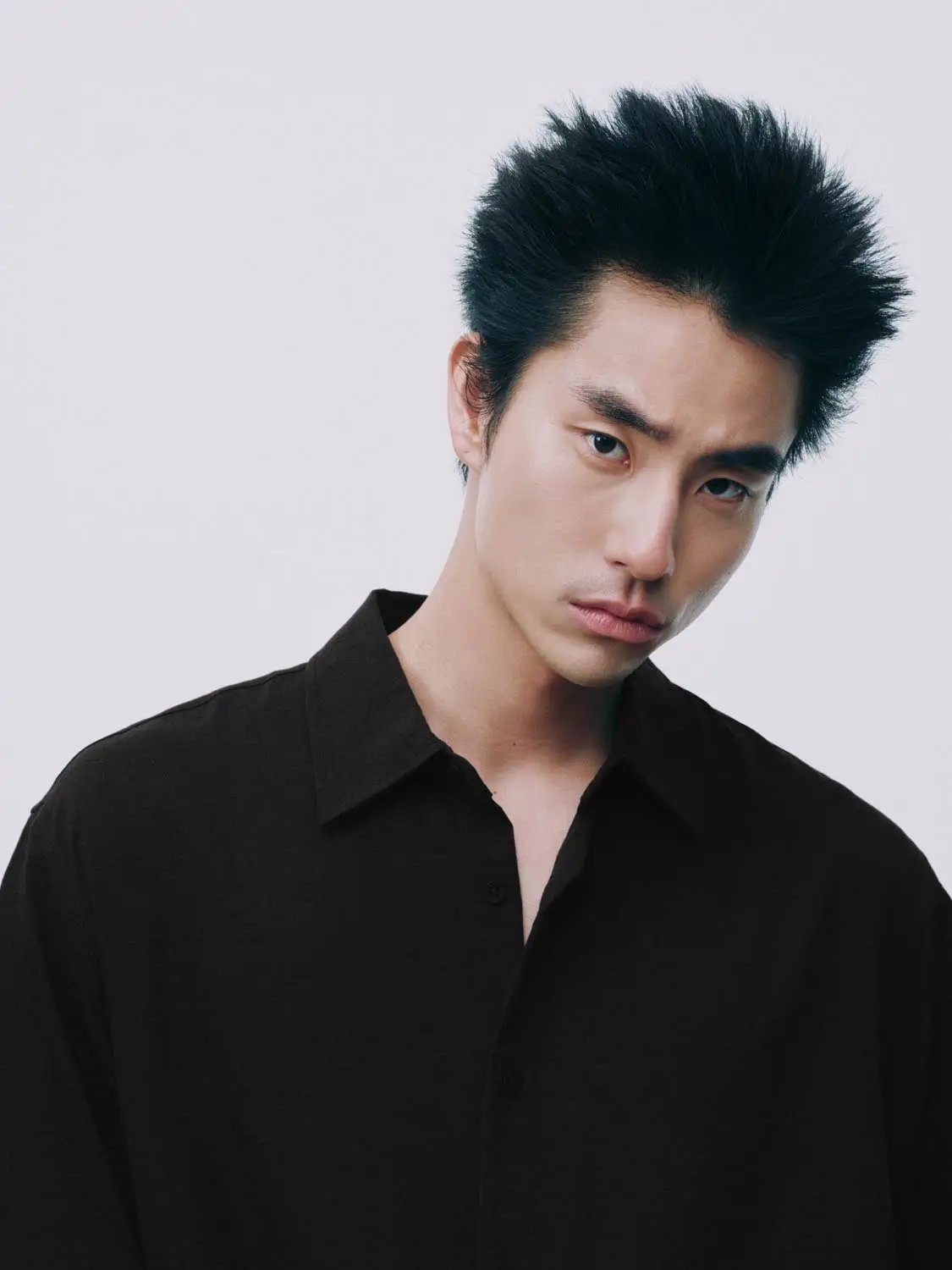 Open-Front Shirt in black; button-down style worn by model