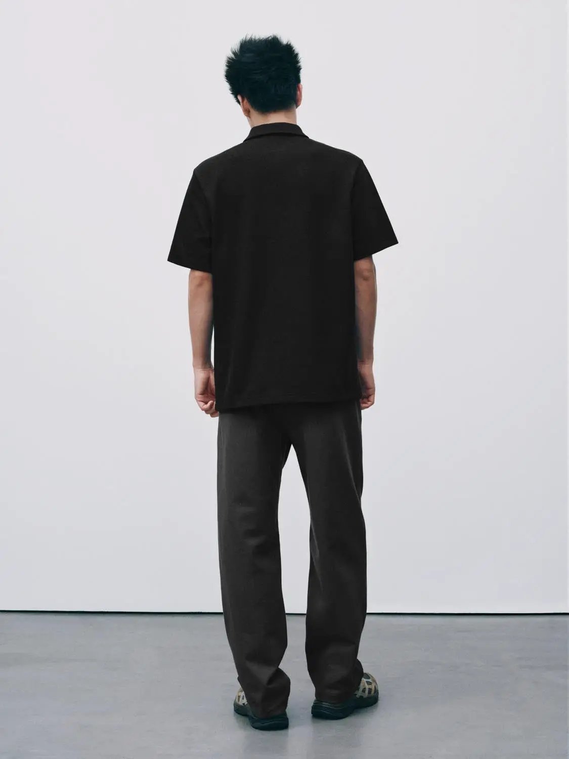 Textured Brushed Polo Cotton Blend Shirt in black, back view.