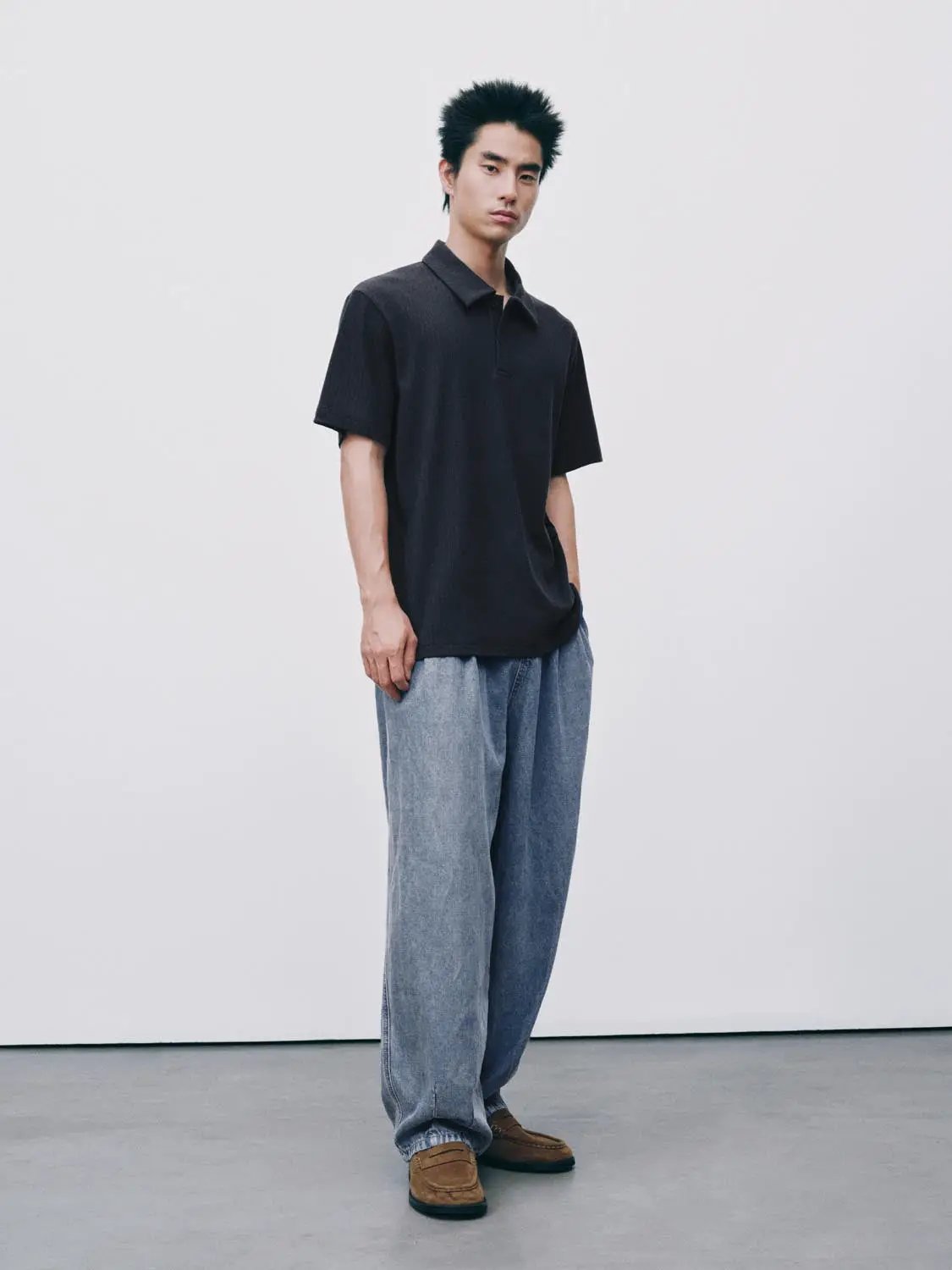 Polo shirt, black short-sleeve, casual men's top on model