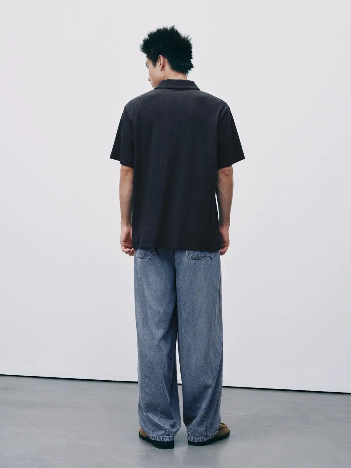 Urban Revivo Fashion polo shirt in dark navy, back view of person wearing jeans.