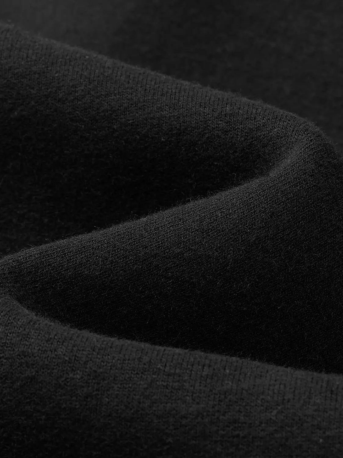 Sweatshirt fabric close-up in black by Urban Revivo Fashion