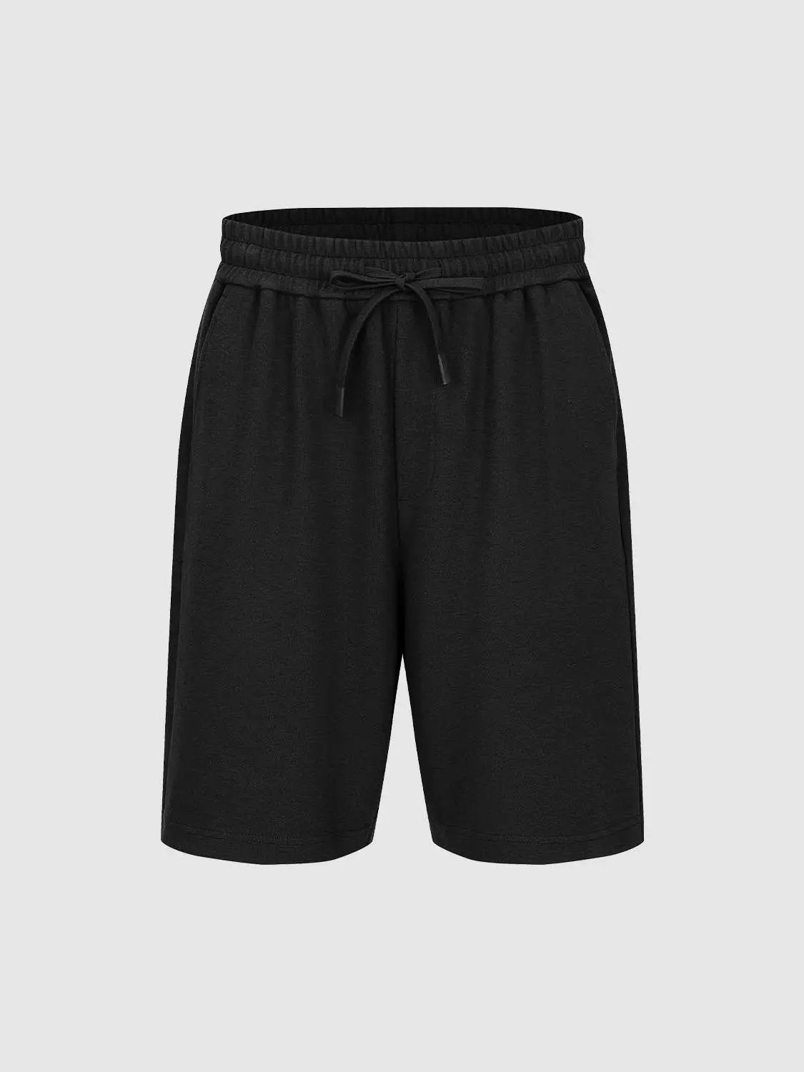 Elastic drawstring waist cotton-blend shorts in black by Urban Revivo Fashion