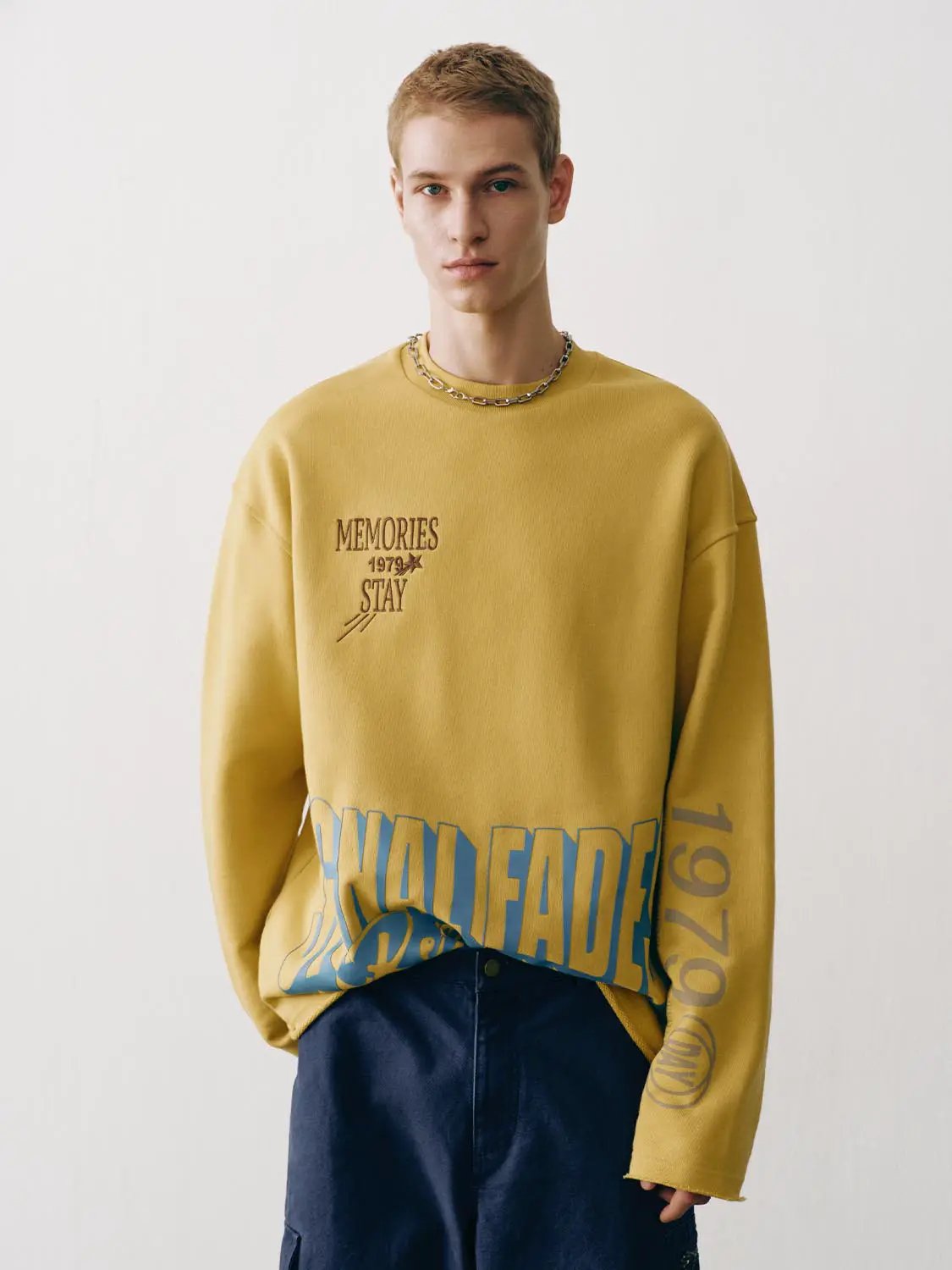 Sweatshirt mustard yellow with large blue graphic text at hem, Urban Revivo Fashion