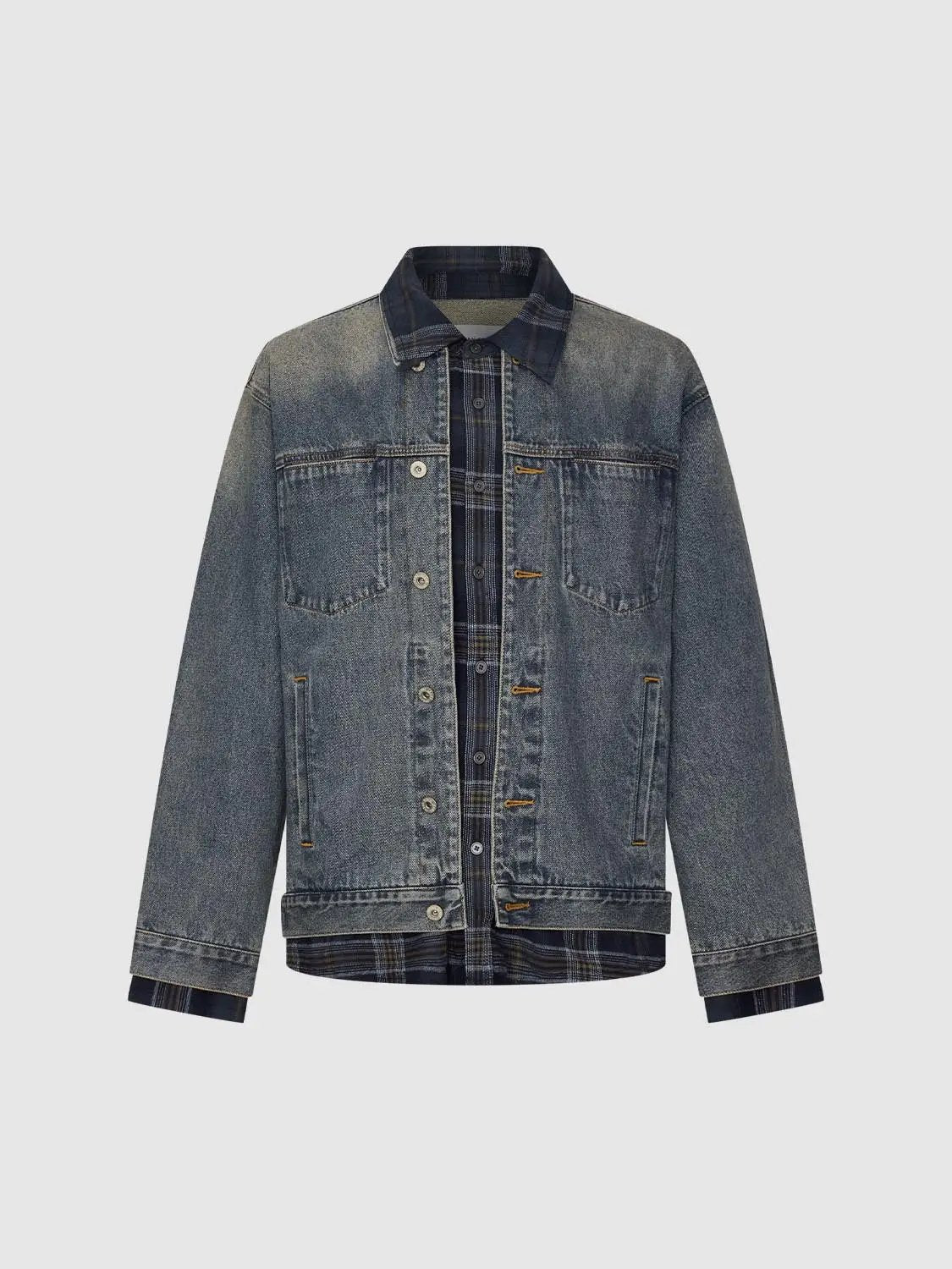 Faded blue denim jacket with checked collar, button front, chest pockets; navy plaid shirt peeks underneath.