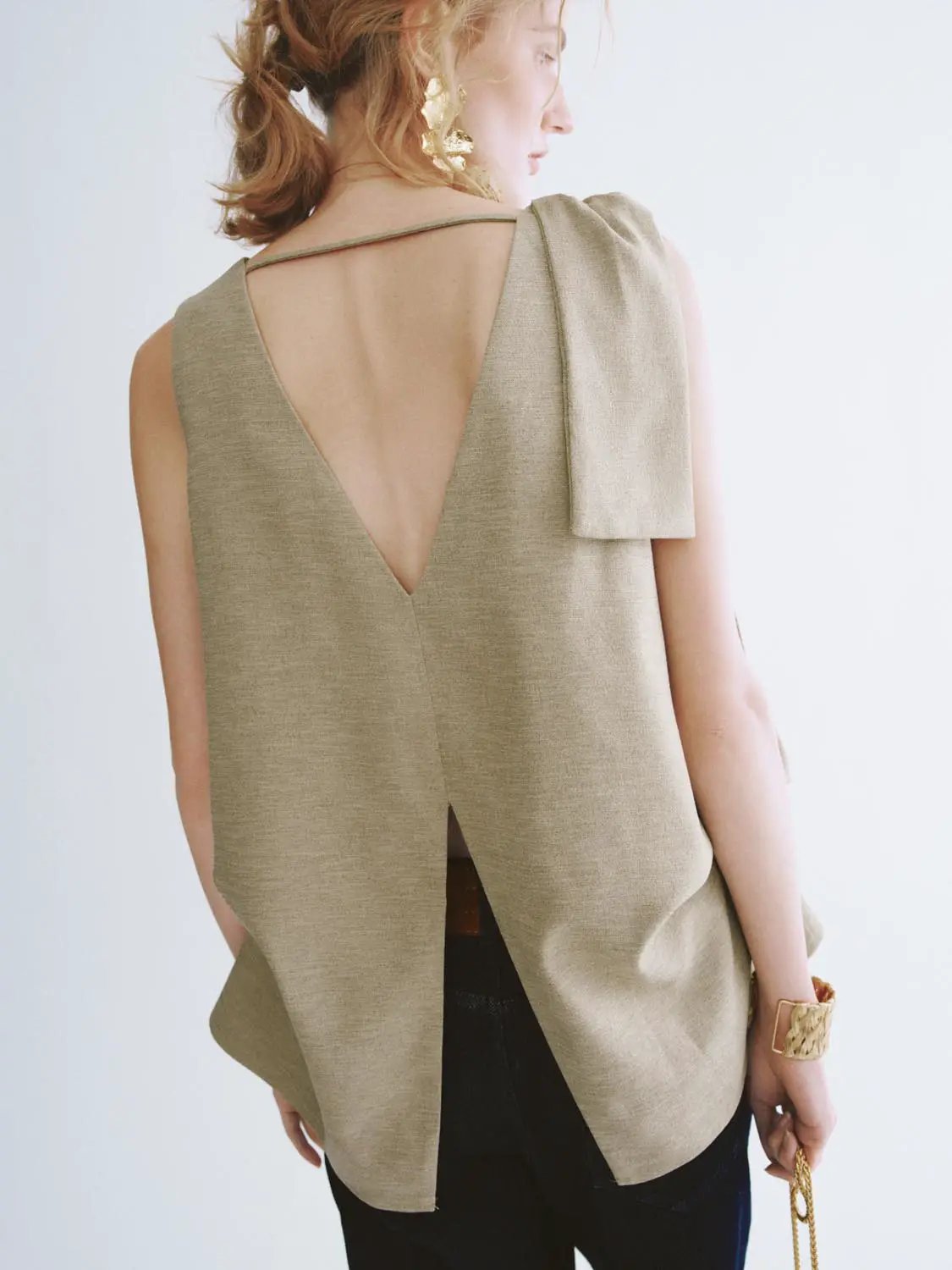 Textured draped overlay beige sleeveless blouse by Urban Revivo Fashion with open back detail.