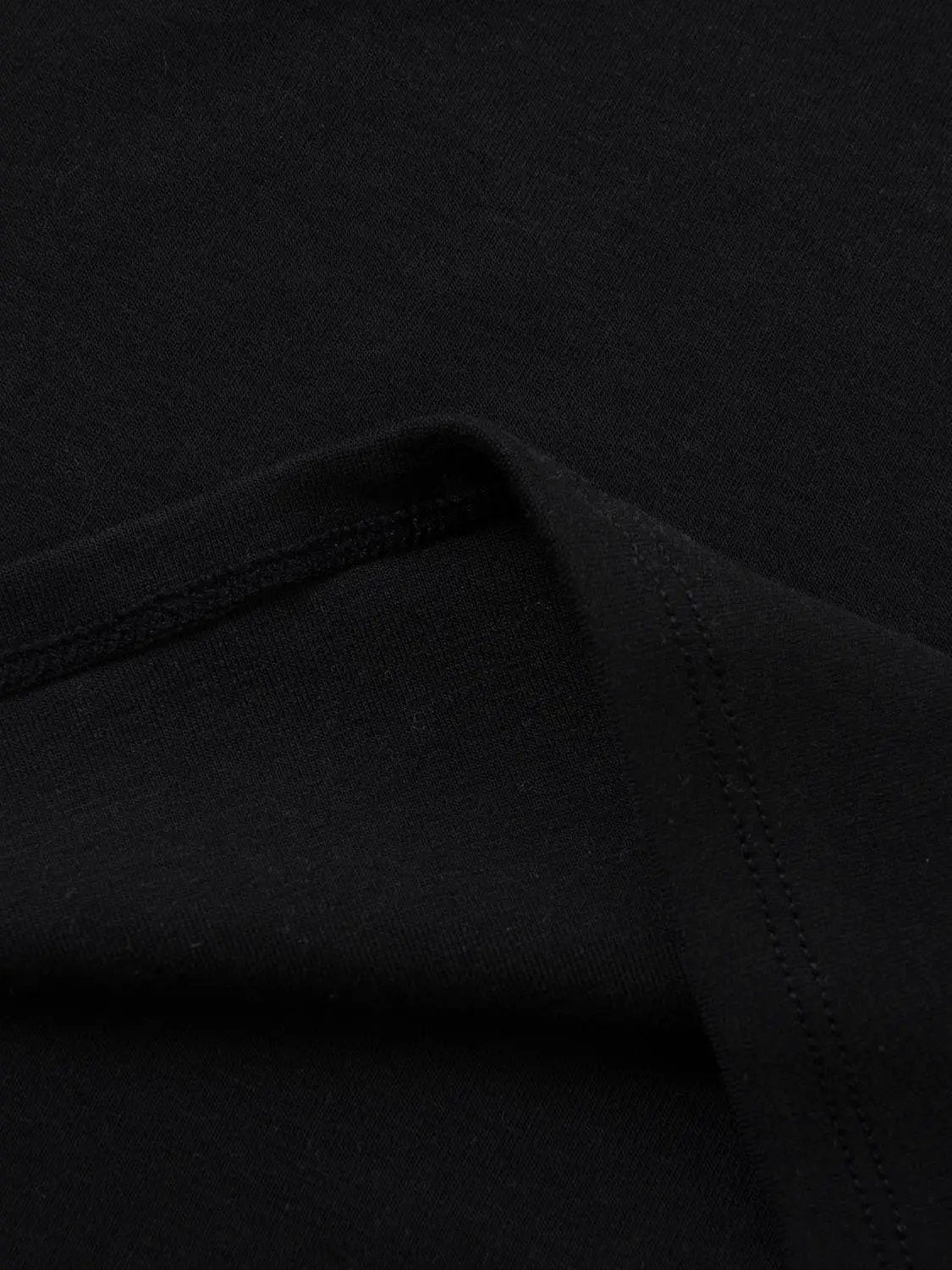 Tank Top with black cotton fabric and visible stitching detail.