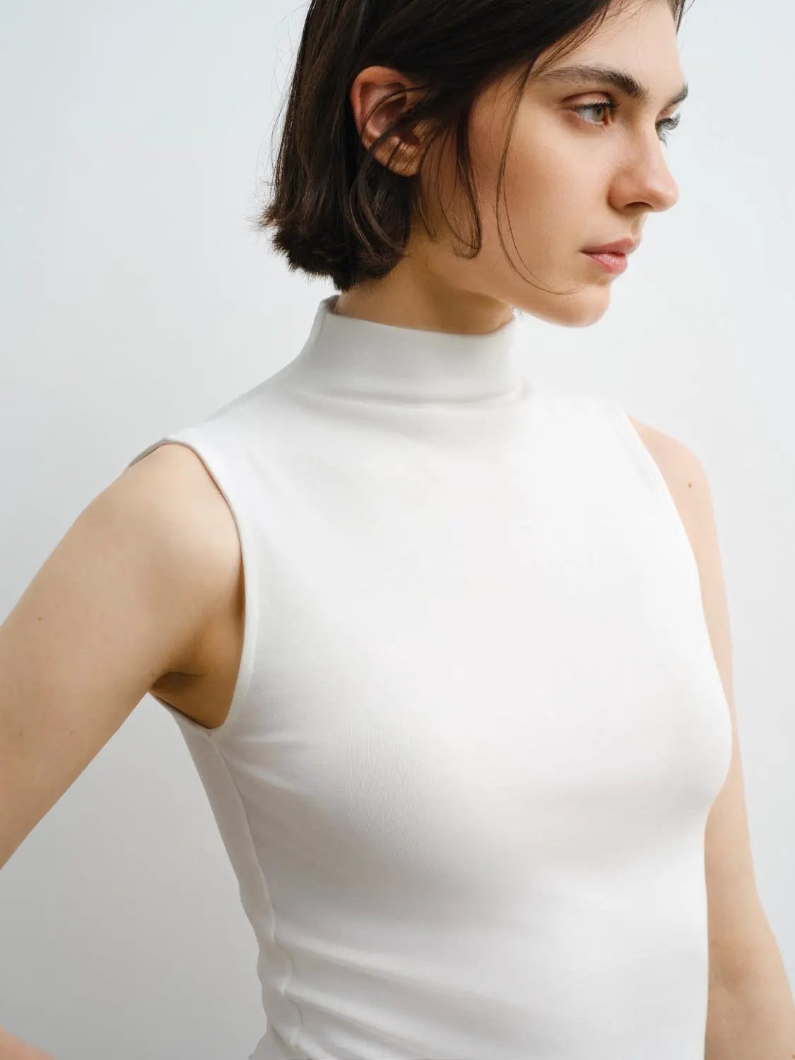 Tank top in white by Urban Revivo Fashion with a high neckline.