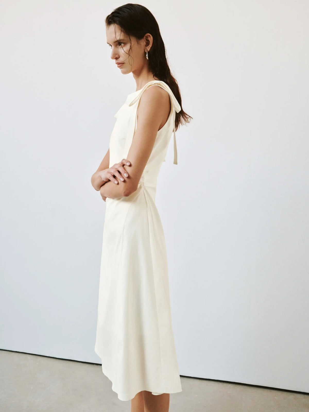 Viscose-blend sleeveless nipped-waist A-line midi dress in ivory by Urban Revivo Fashion