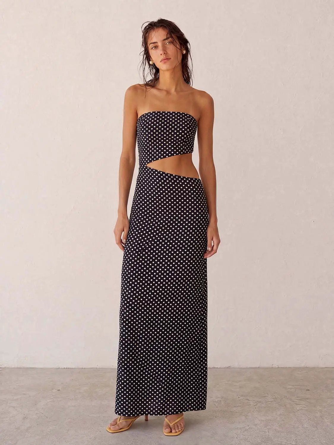 Dresses, skinny-fit strapless black maxi with white polka dots and waist cutout