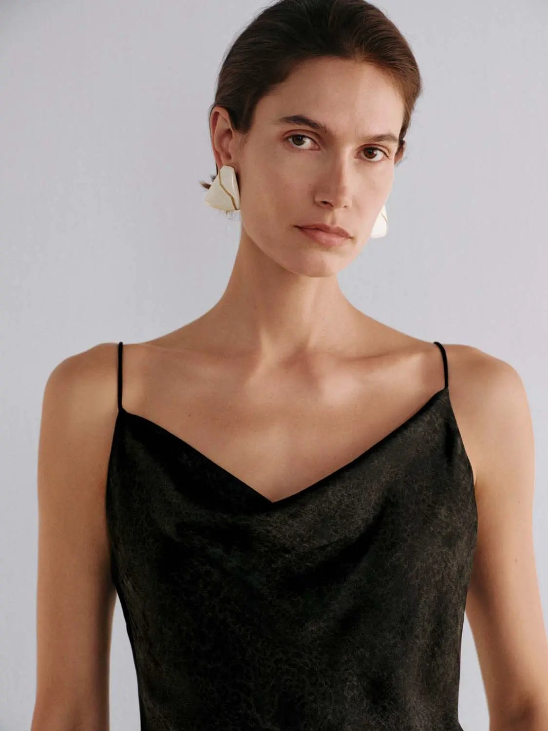Sleeveless Cowl Neck Textured Flared Mini Dress in black by Urban Revivo Fashion