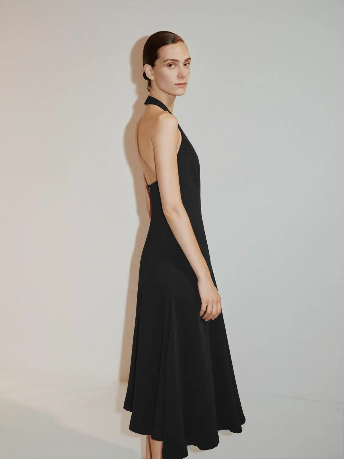 Fitted High Neck Sleeveless A-Line Maxi Dress in black by Urban Revivo Fashion.