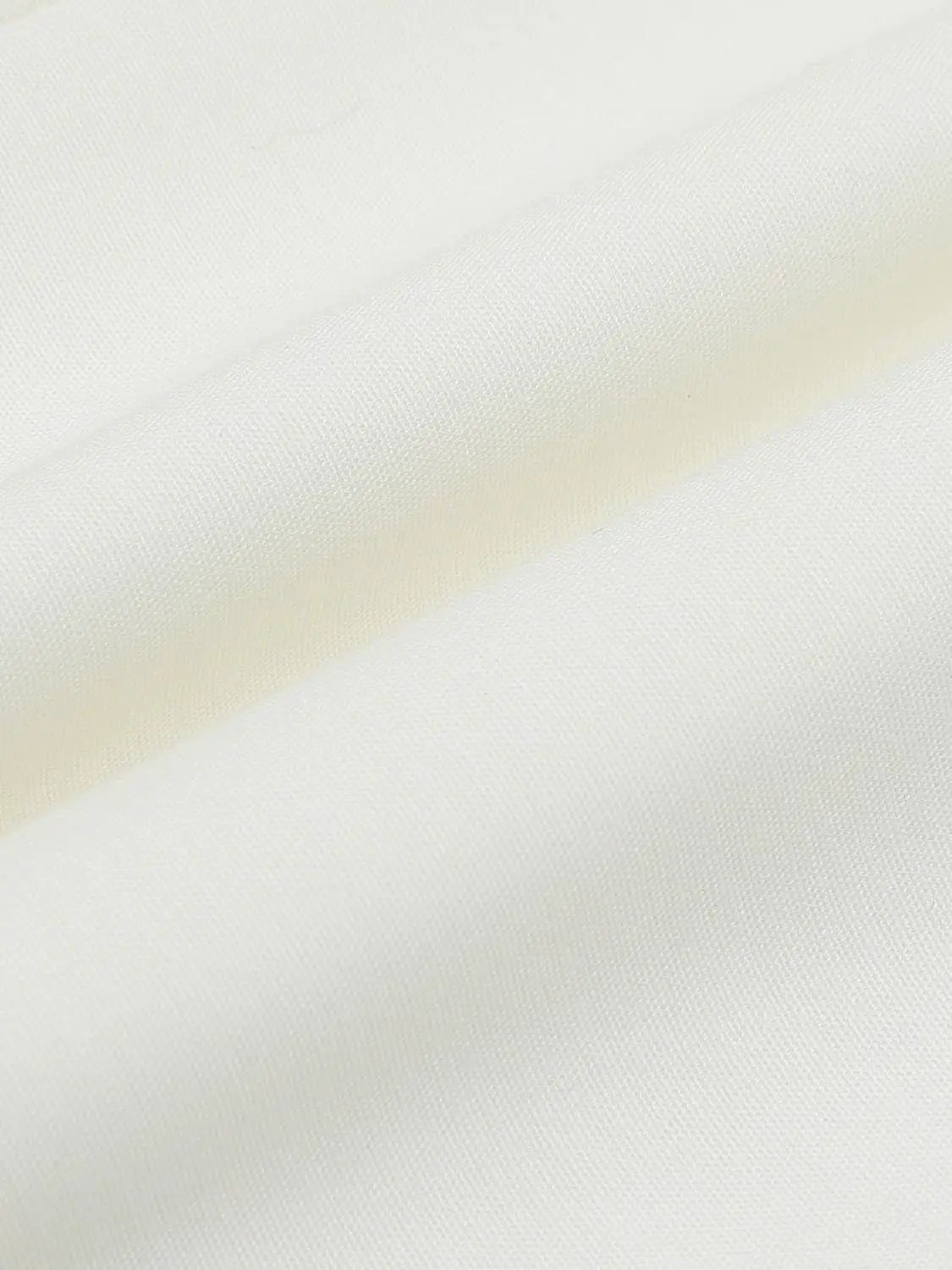H-line dress fabric in ivory satin with subtle sheen.