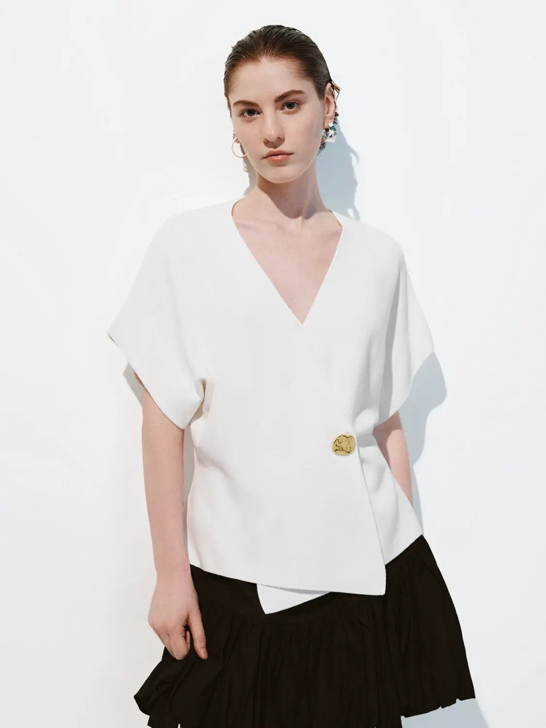 Wrap V-Neck Batwing Short-Sleeve Knitted Cardigan in white with a gold button detail