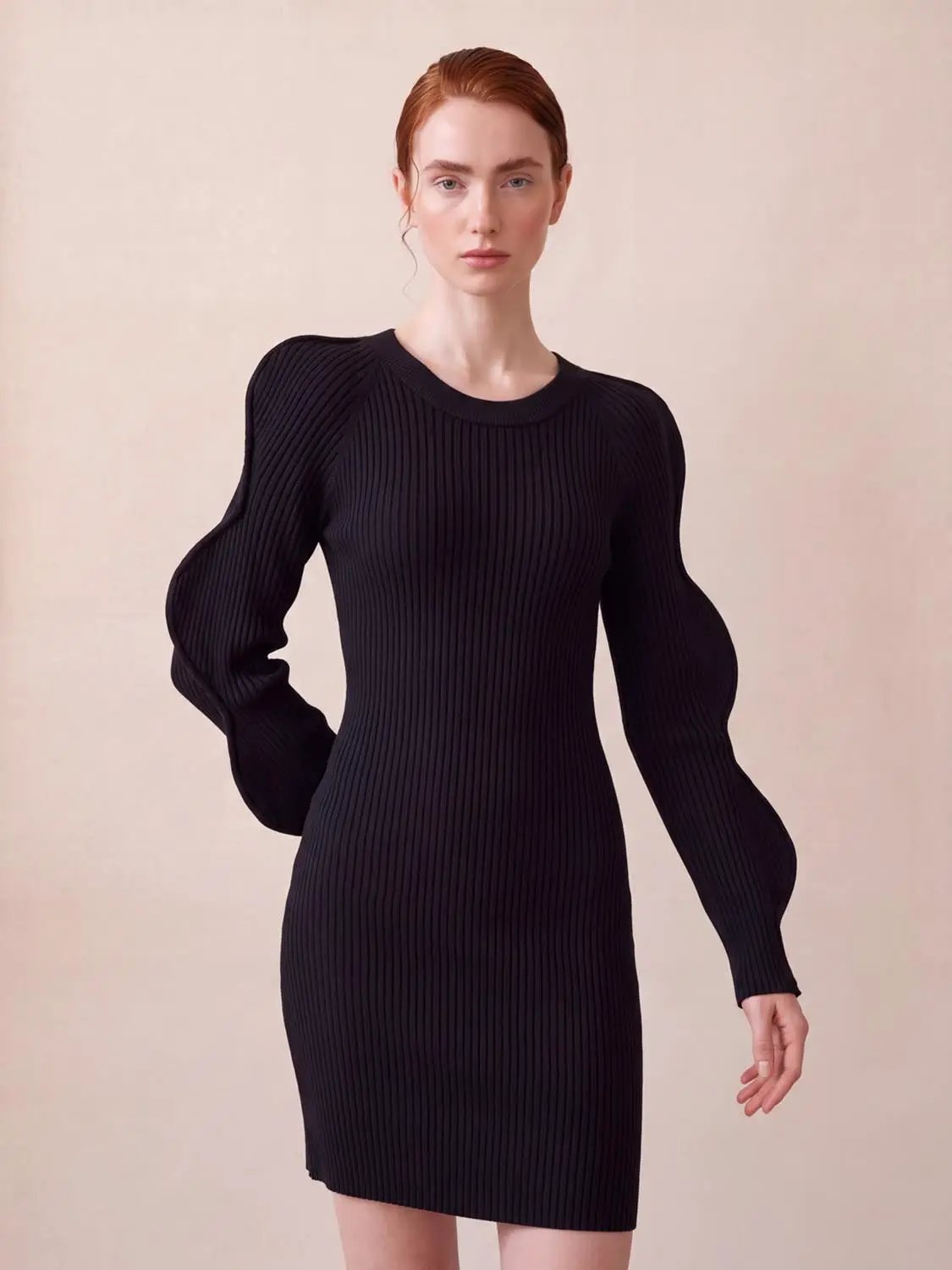 Wave Sleeve Knitted Midi Dress in black ribbed knit with sculpted puff sleeves