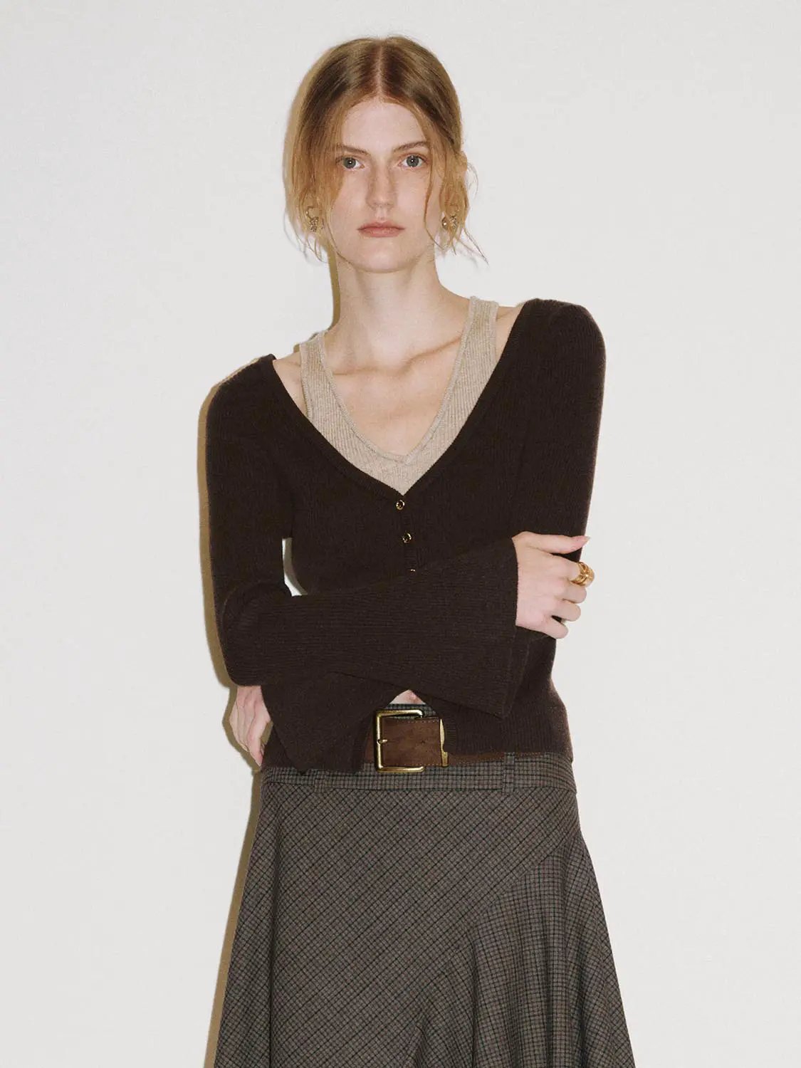 Urban Revivo Fashion Knit T-Shirt in dark brown knit, paired with beige underlayer and plaid skirt