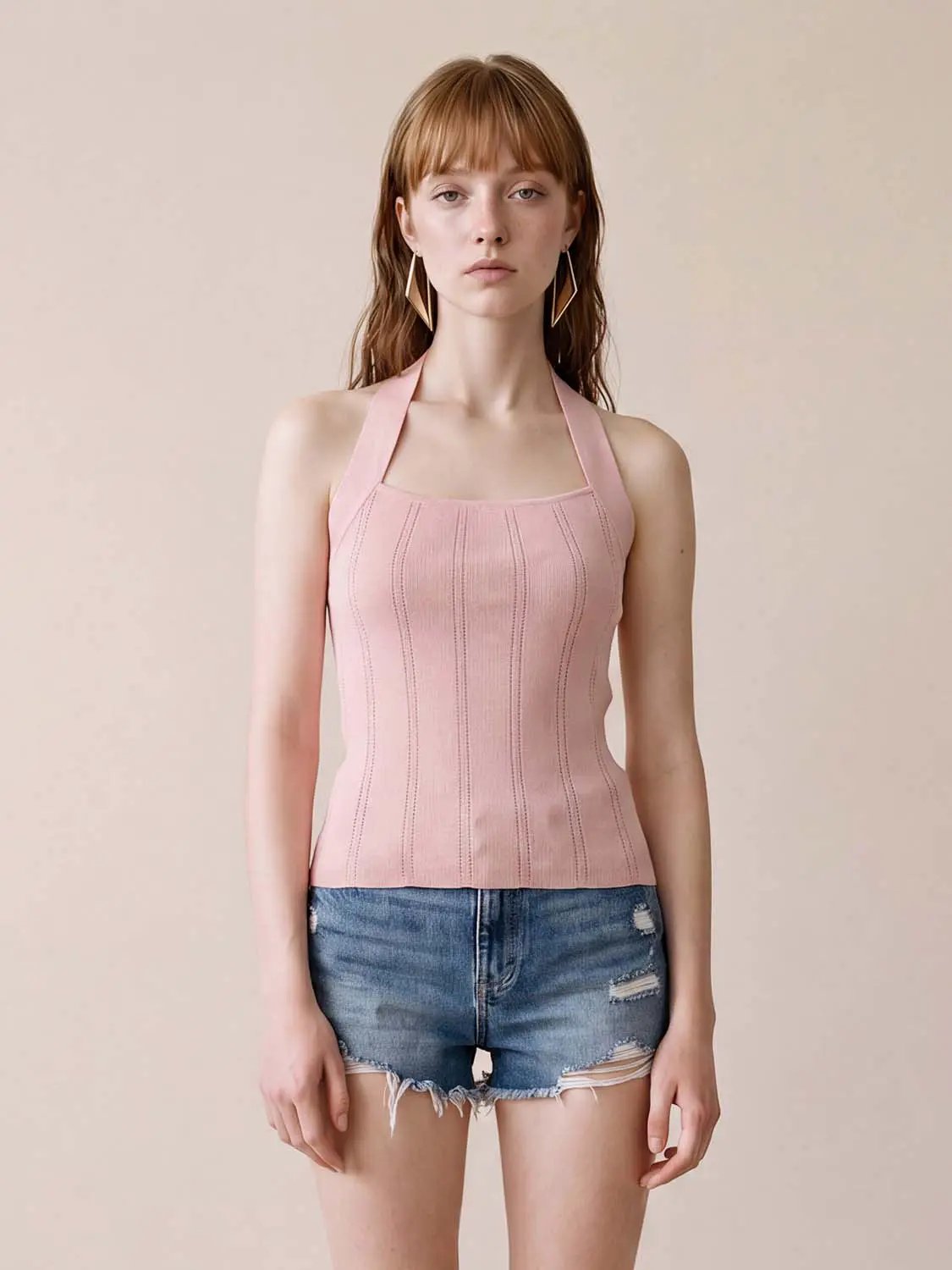 Knitted pink halter top for women with ribbed vertical panels