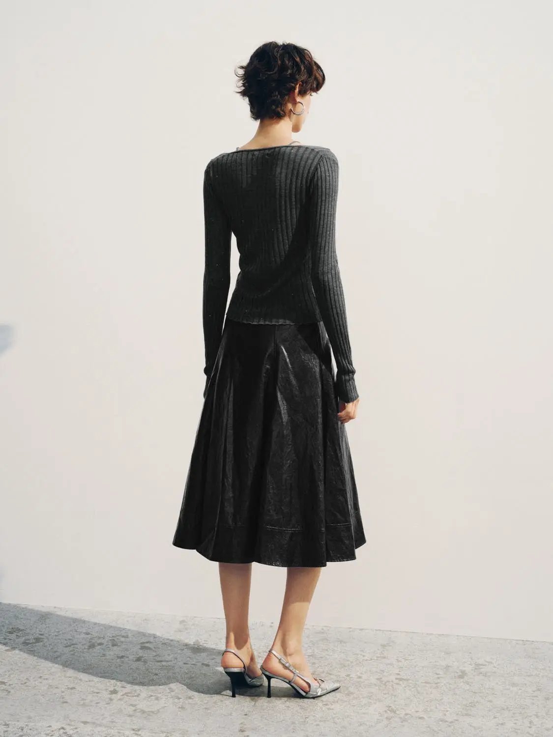 Fitted ribbed V-neck cardigan with long sleeves in dark knit; two-item Urban Revivo Fashion outfit with black midi skirt