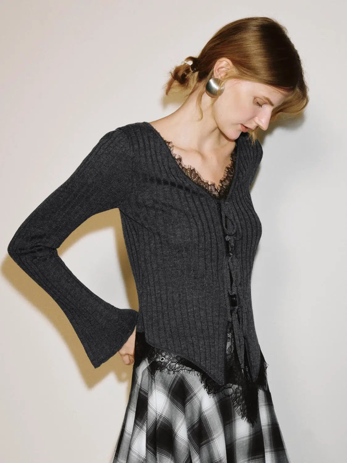 Knitwear cardigan in charcoal ribbed knit with lace trim at neckline and hem, long sleeves