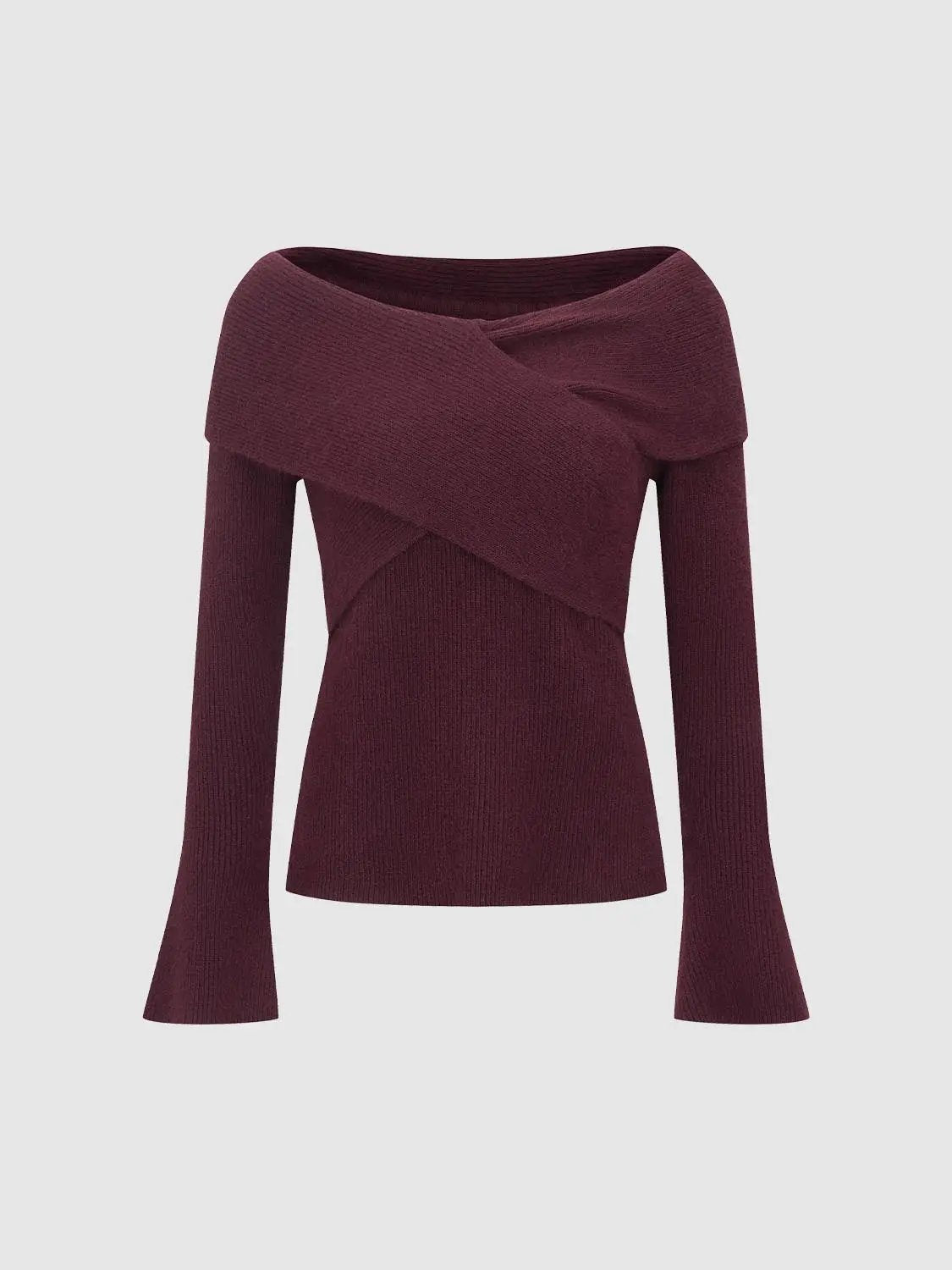 Knit Top in burgundy rib-knit with a crossover wrap front and flared long sleeves.