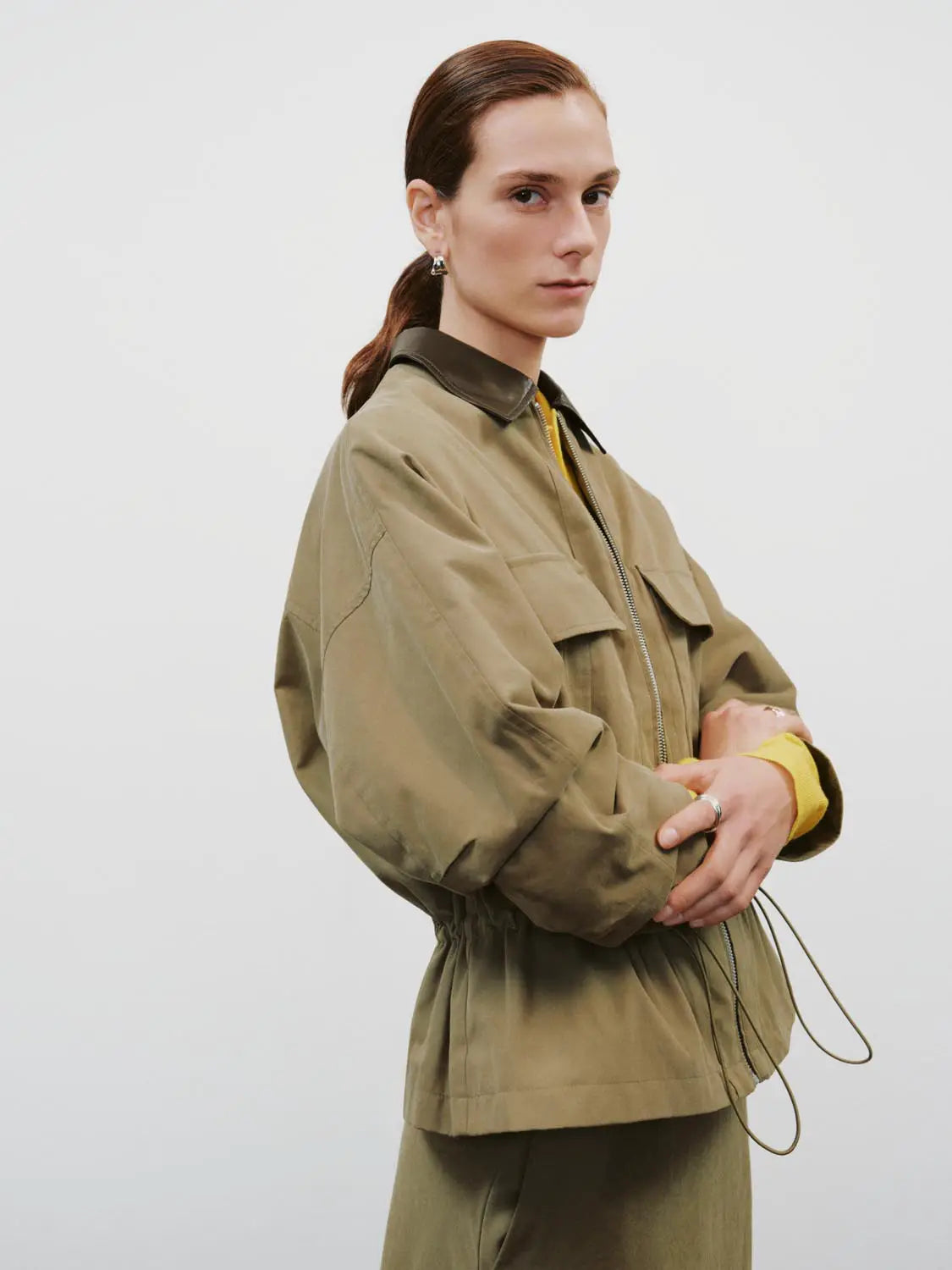 Padded Jacket khaki with dark brown collar, zip-front closure, drawcord hem
