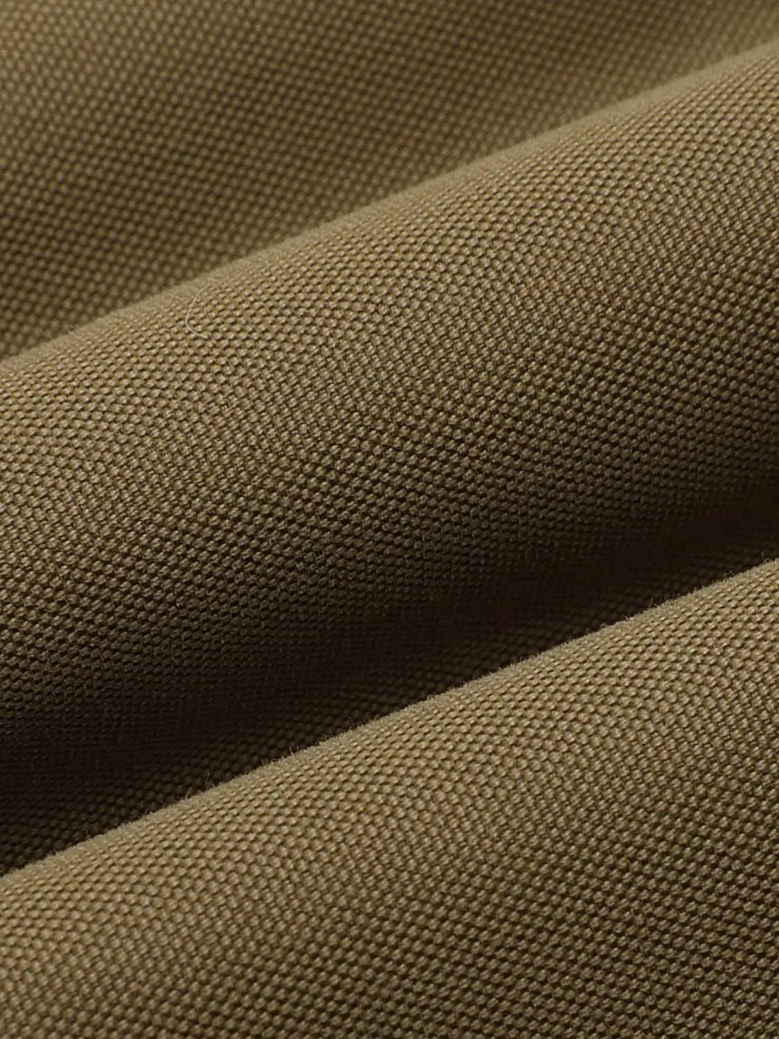Padded Jacket brown textured fabric close-up with woven texture detail