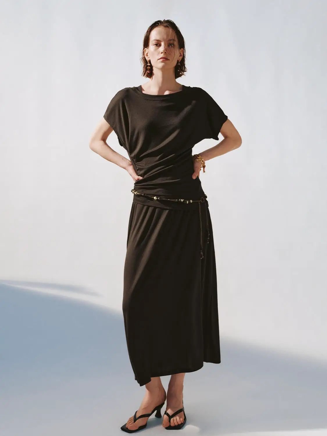 Boat neck strappy draped straight midi dress by Urban Revivo Fashion in black, with waist belt.