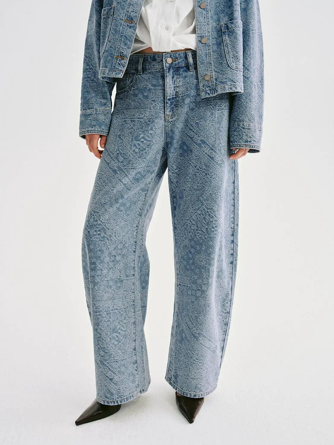 Denim Jeans by Urban Revivo Fashion; light blue wide-leg fit with embossed textured pattern