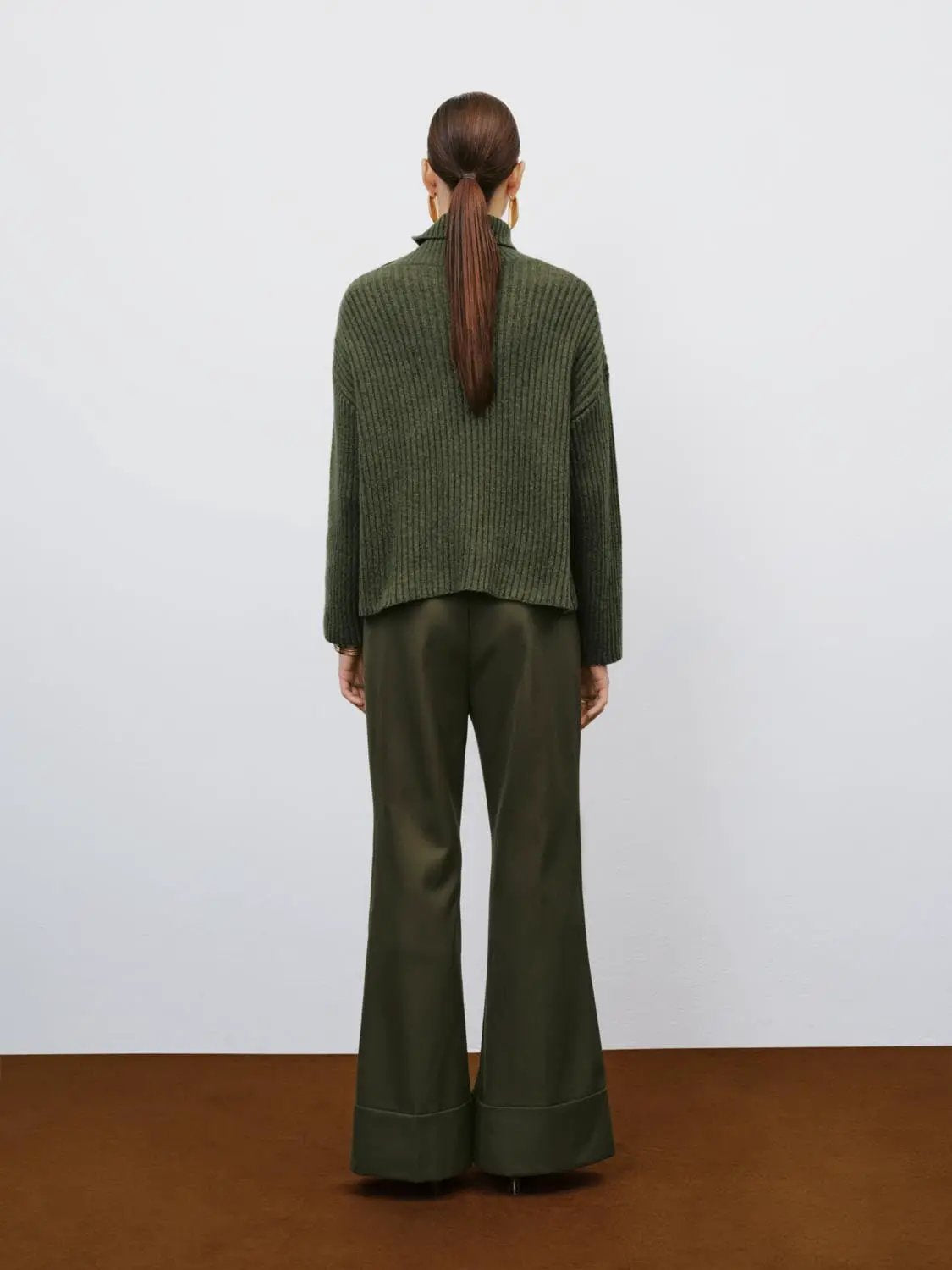 Ribbed asymmetric button long sleeve sweater, olive green knit.