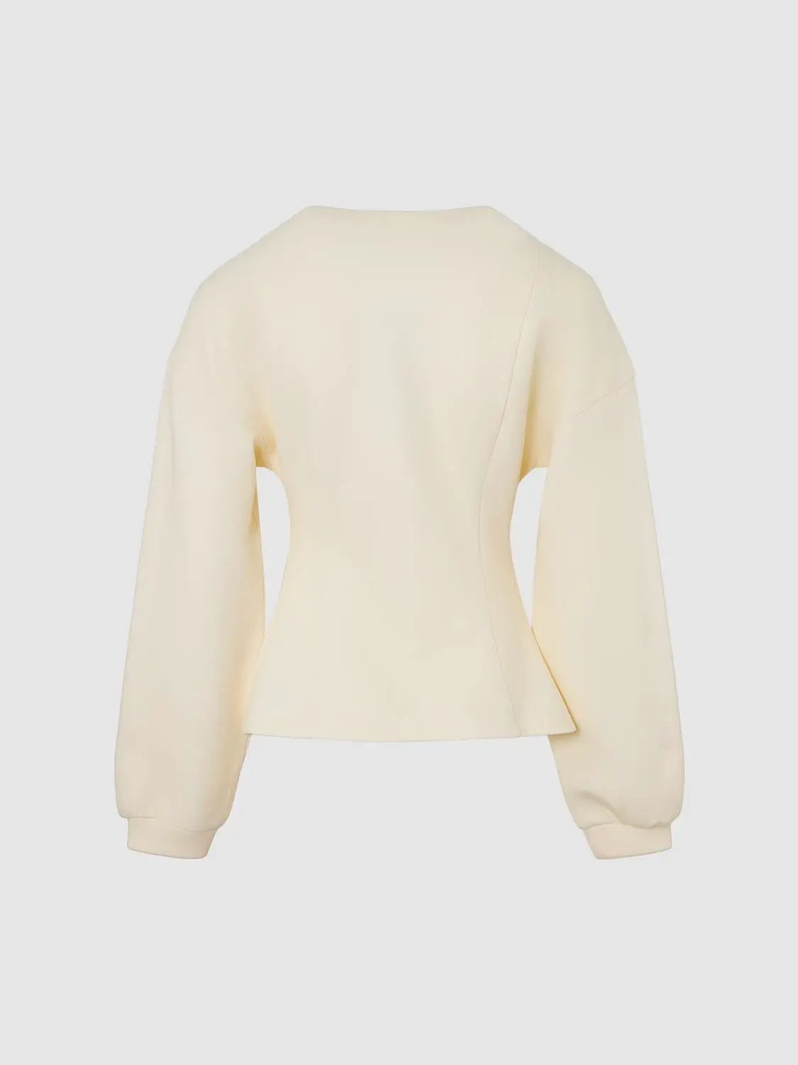 V Neck Zip Front Fitted Waist Cropped Jacket in cream with long sleeves.