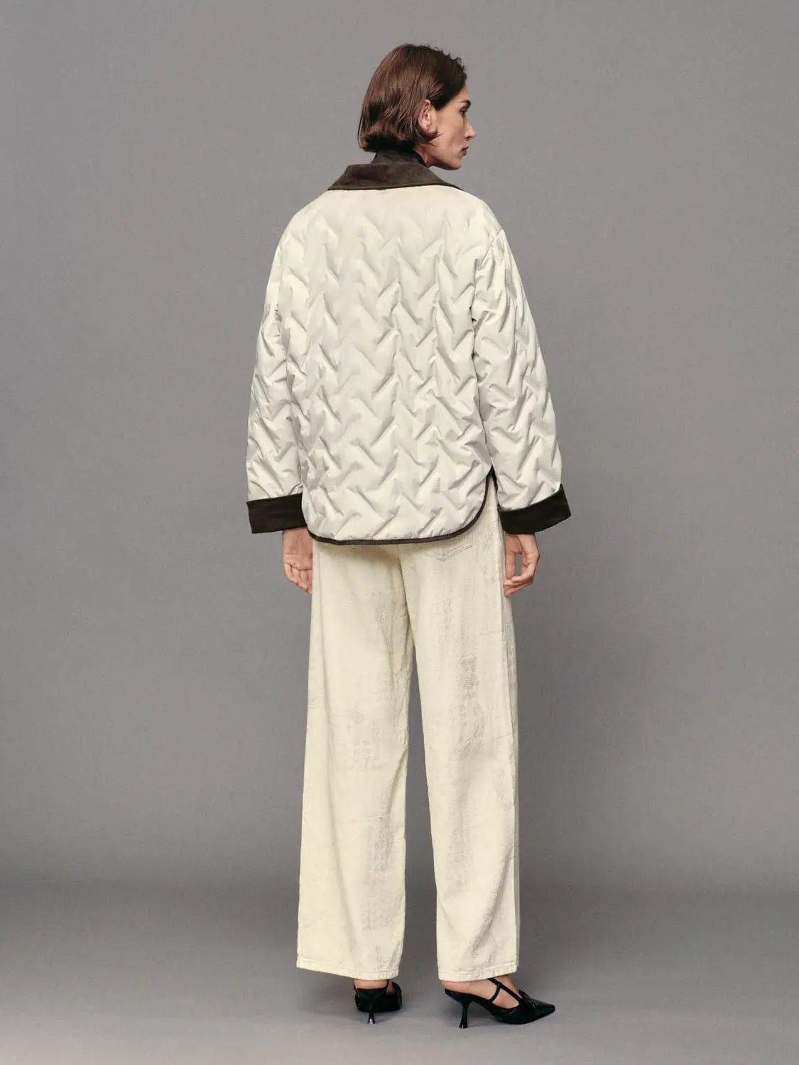 Urban Revivo down jacket, cream quilted with brown collar and cuffs, back view.