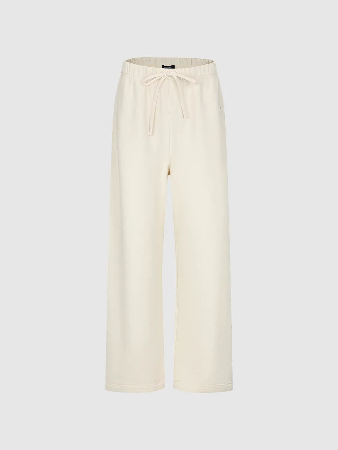 Wide-leg pants in ivory with elastic waistband and drawstring