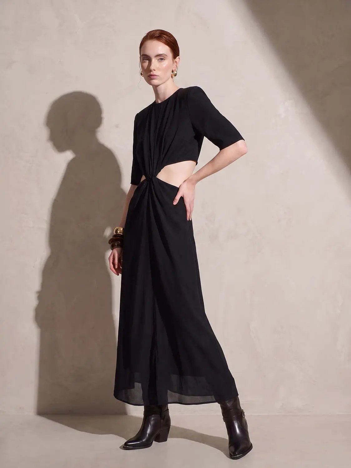 Round Neck Padded Shoulder Cutout Knotted Waist Midi Dress in black