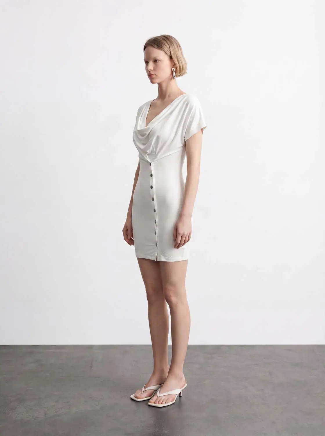 Draped cowl-neck mini dress with front buttons in ivory by Urban Revivo Fashion