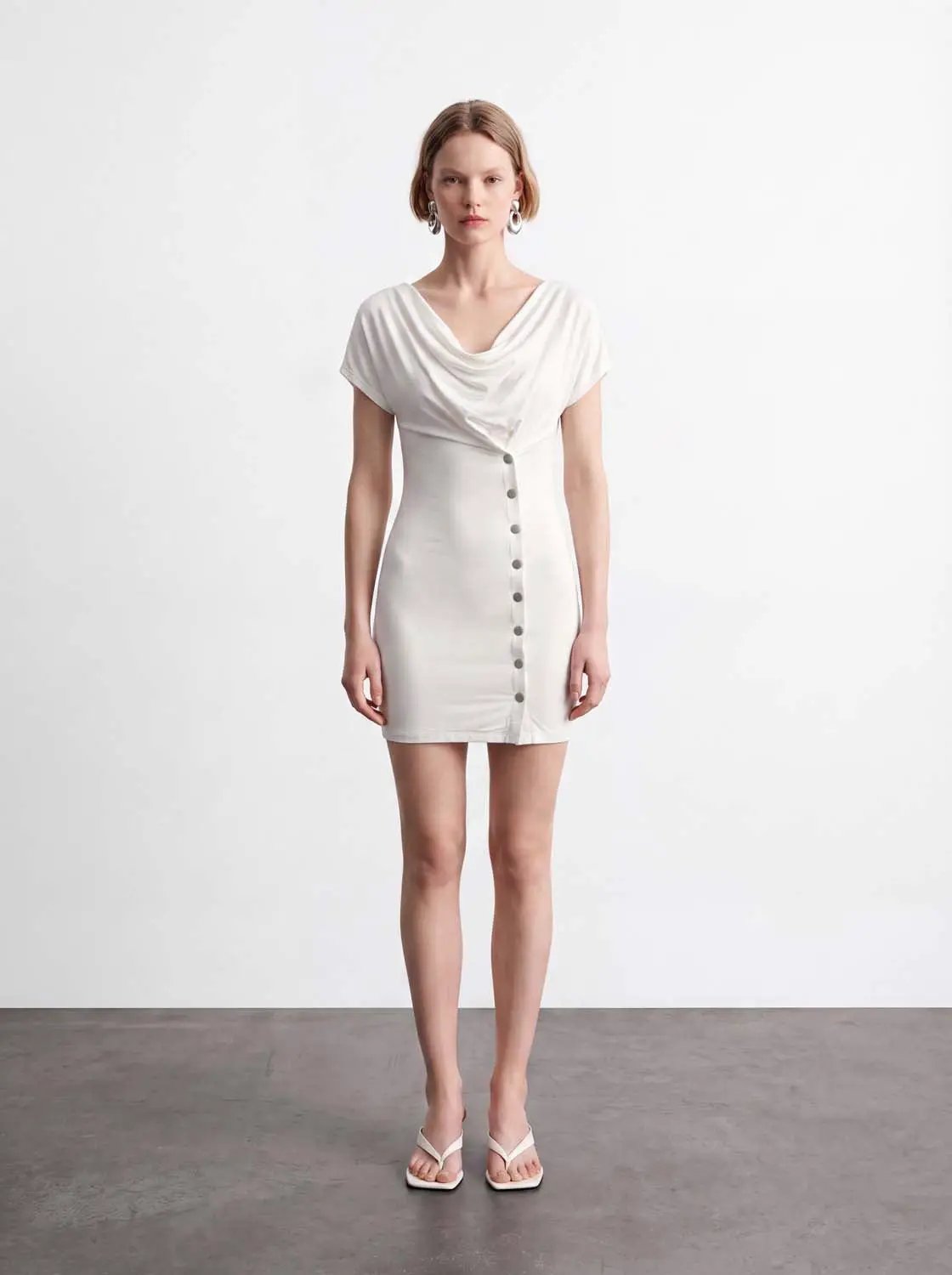 Draped cowl-neck mini dress in ivory with front button row, Urban Revivo Fashion.