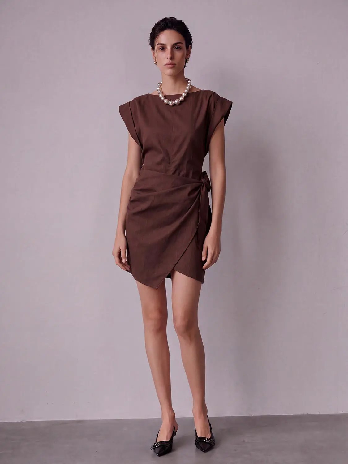 Fit-and-Flare dress by Urban Revivo, brown wrap-waist skater style with asymmetric hem