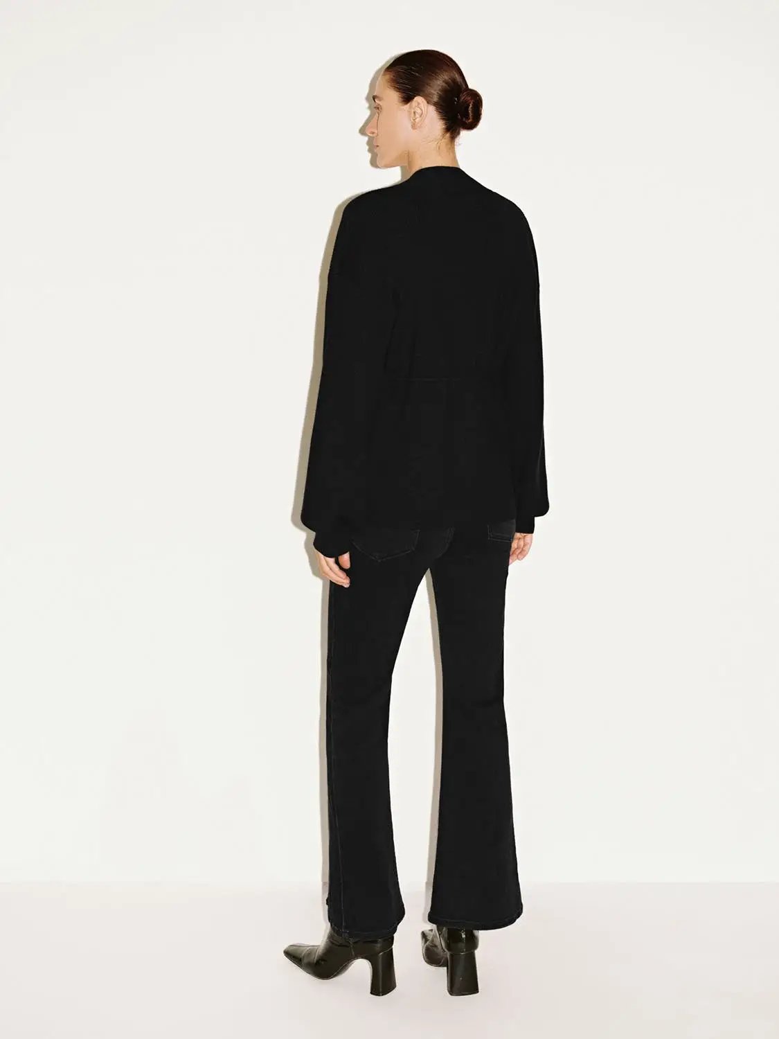 Zip Up Balloon Sleeve Knitted Cardigan in black by Urban Revivo Fashion, back view.